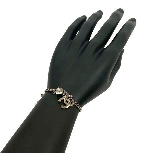 CHANEL Silver Logo Charm Bracelet